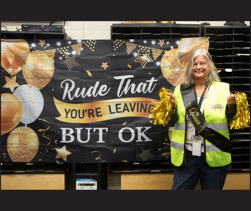 woman with gold pom poms