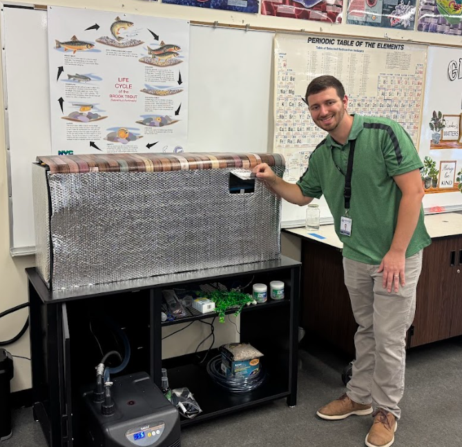 teacher with trout tank