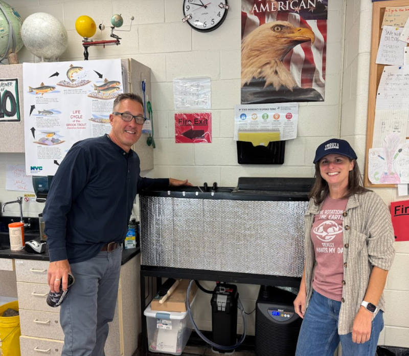 teachers with trout tank