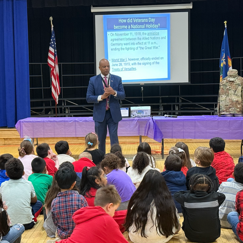 man standing in auditorium