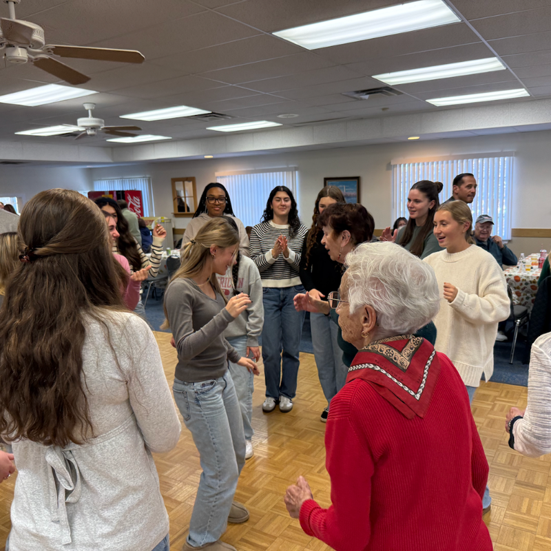 woman with red shirt dancing