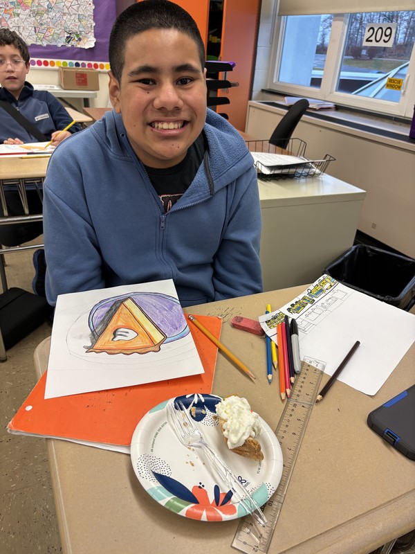 student drawing pumpkin pie
