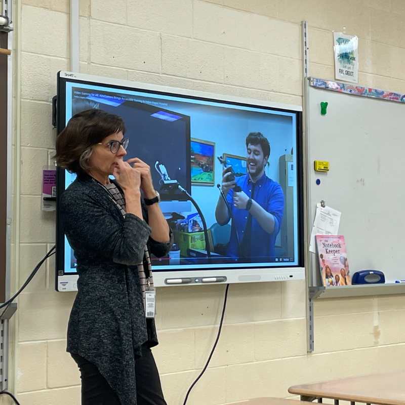 woman standing in classroom 