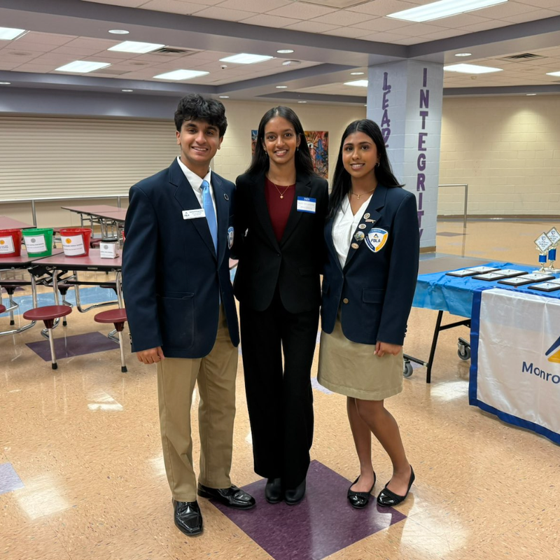 three students standing 