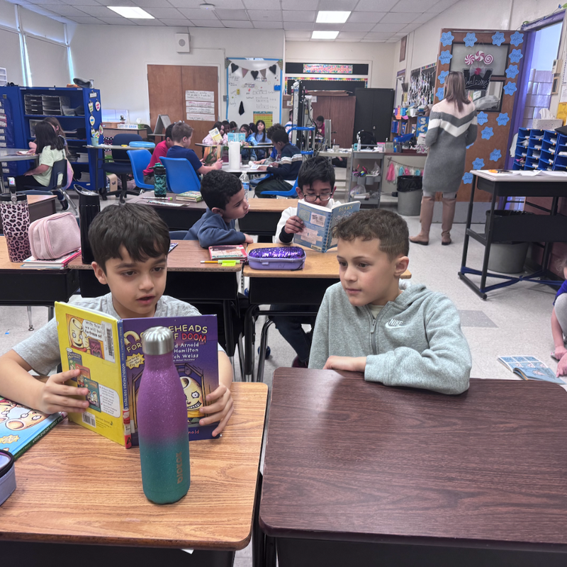students reading in class