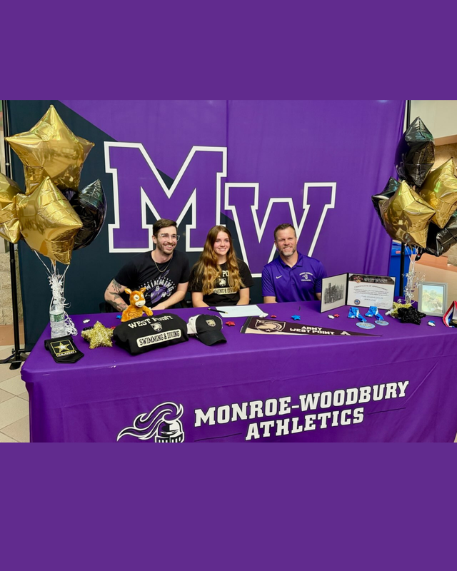 Molly at signing with her coaches
