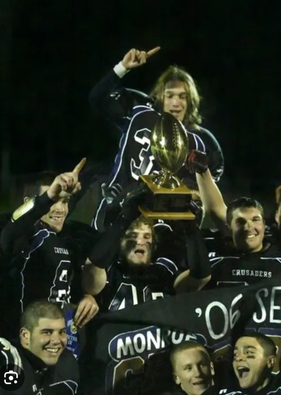 2005 Championship football team with trophy - 2026 HOD Honorary Recognition