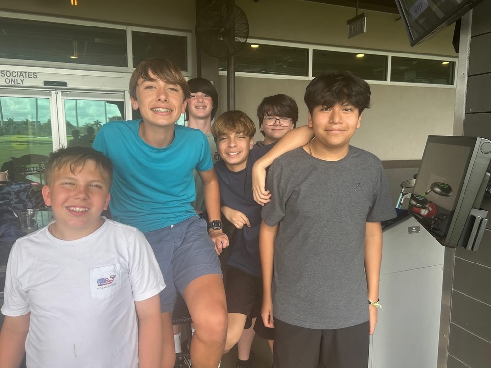 boys at top golf