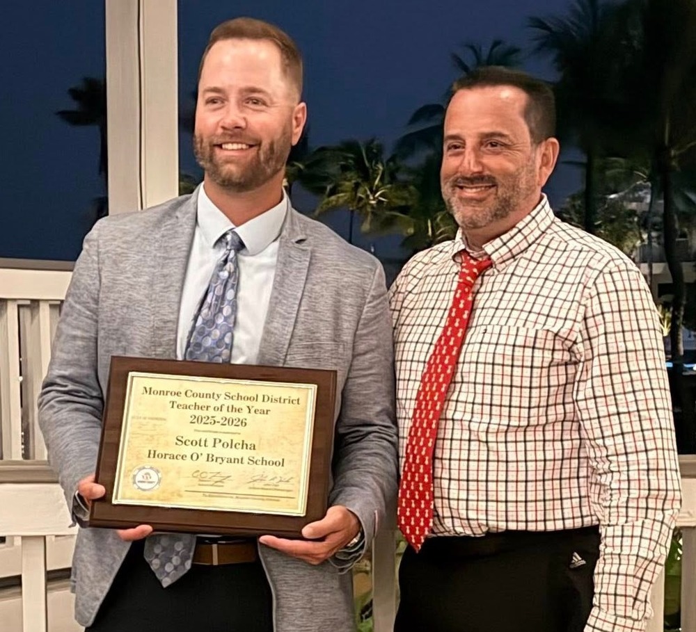 Teacher of the Year Polcha with prinipal