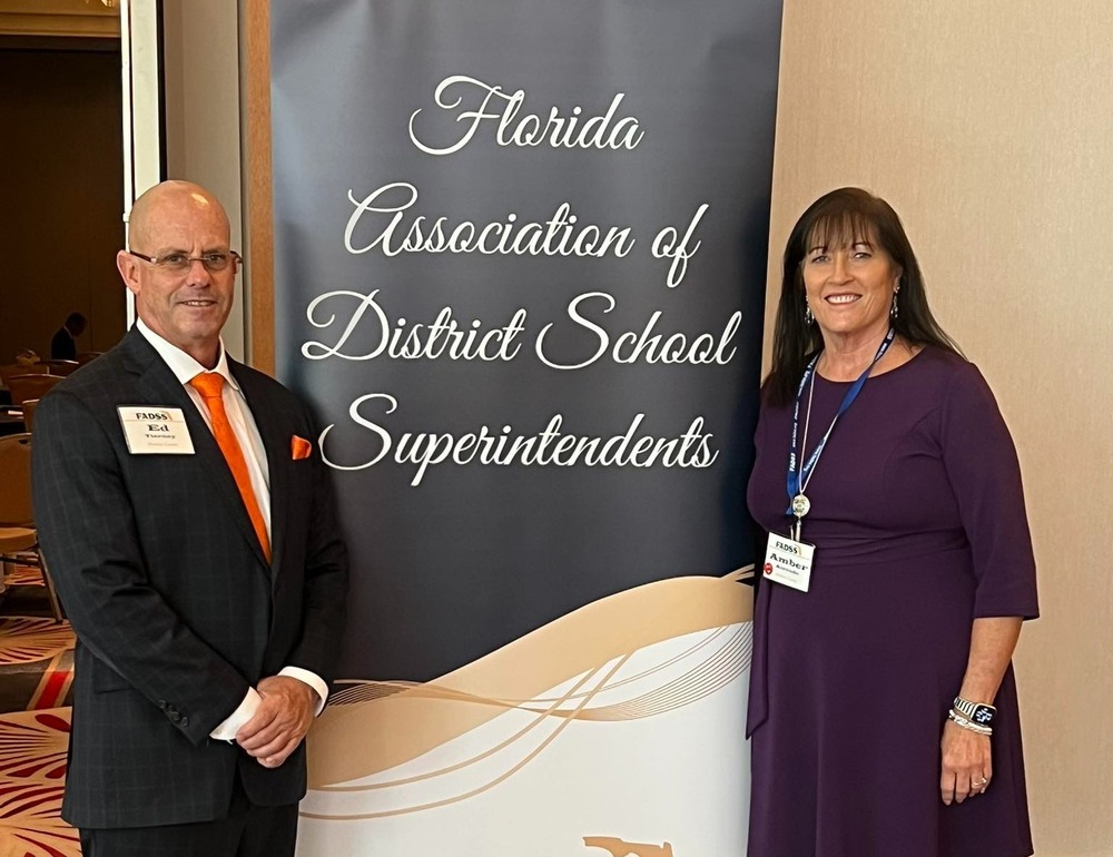 Superintendent and Deputy Superintendent at a conference