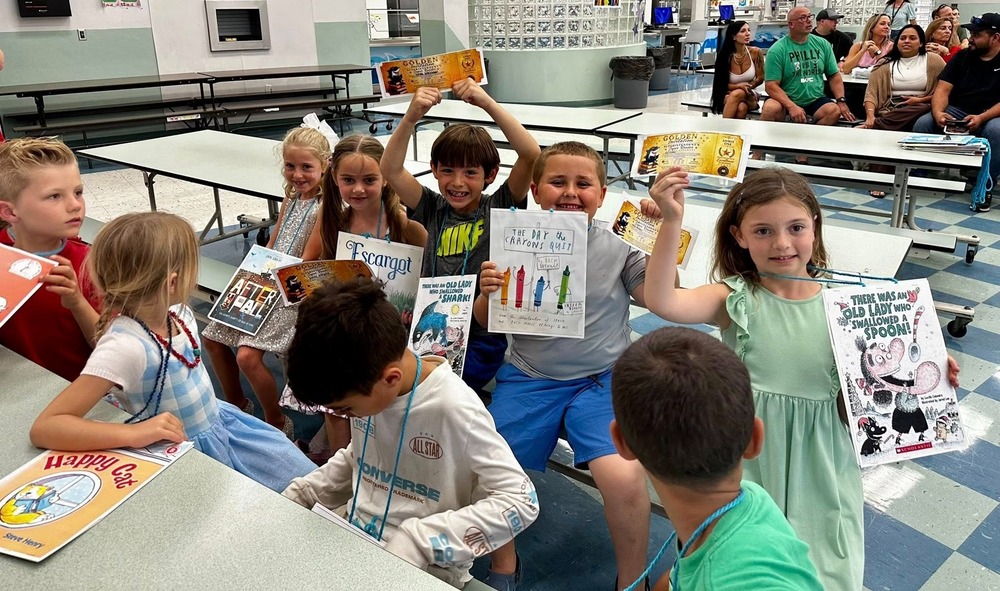 Group of kids with books