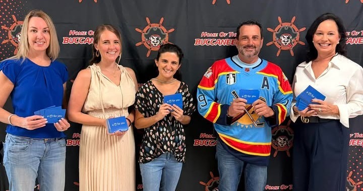 Principal with Rotary Club members