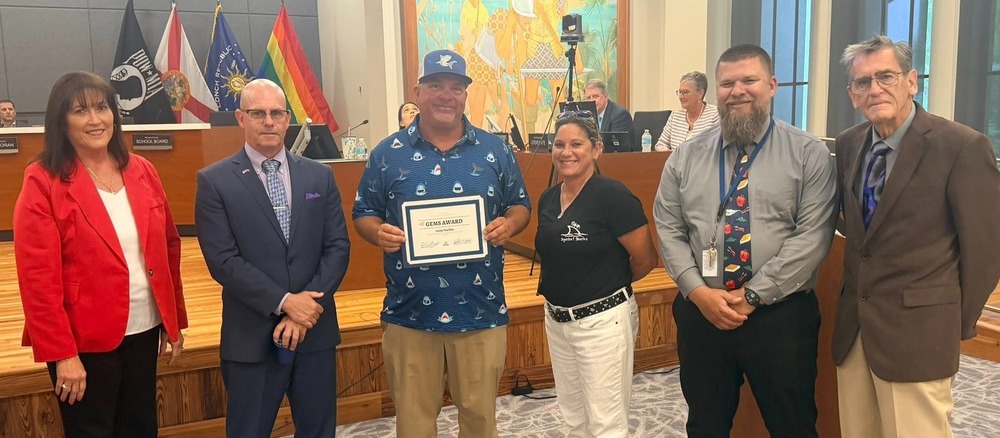 School Board group with coach honoree