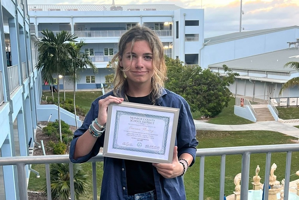 Emerson Fleming with certificate