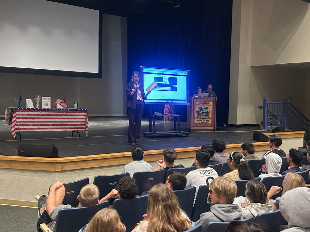 preseenter speaking to students