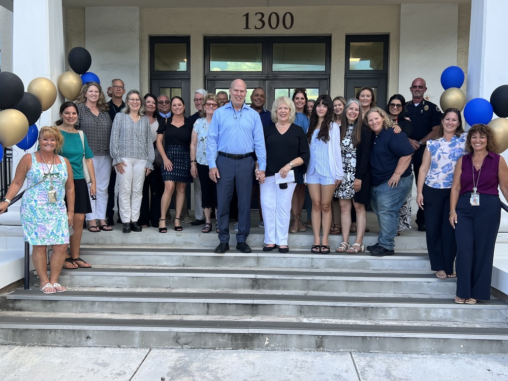 Axford with group from school district headquarters