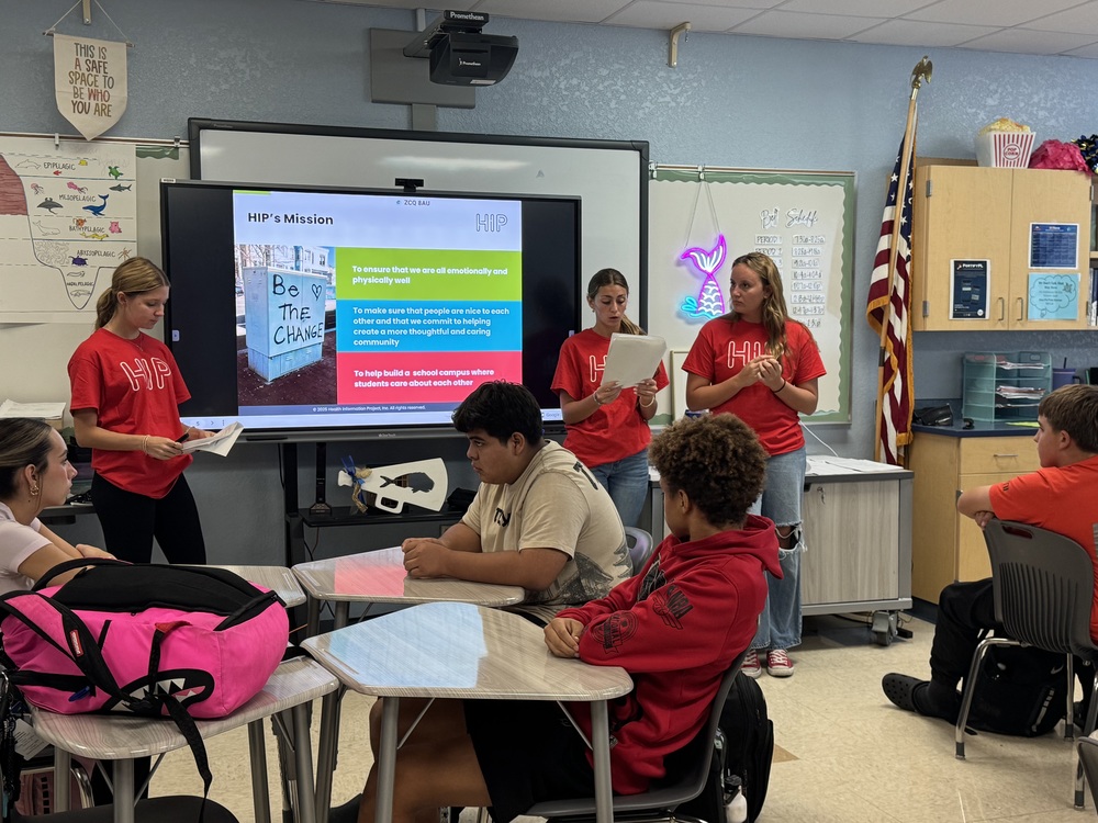 students teaching other students a lesson