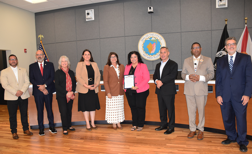 City Commission and Mayor Henriquez with Daliana Goins