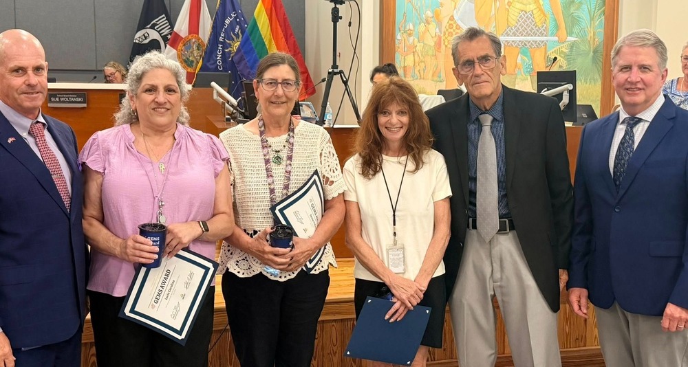 Food Services employees receive a GEM Award and are pictured with Superintendent Tierney, Board Chair John Dick and  Operations Director Pat Lefere