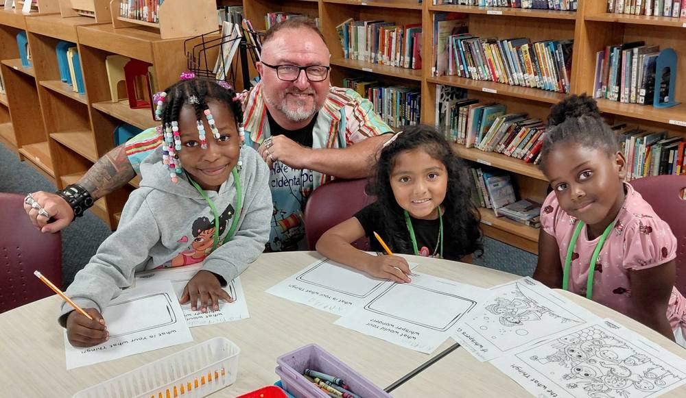 Author Nate Whiting with students