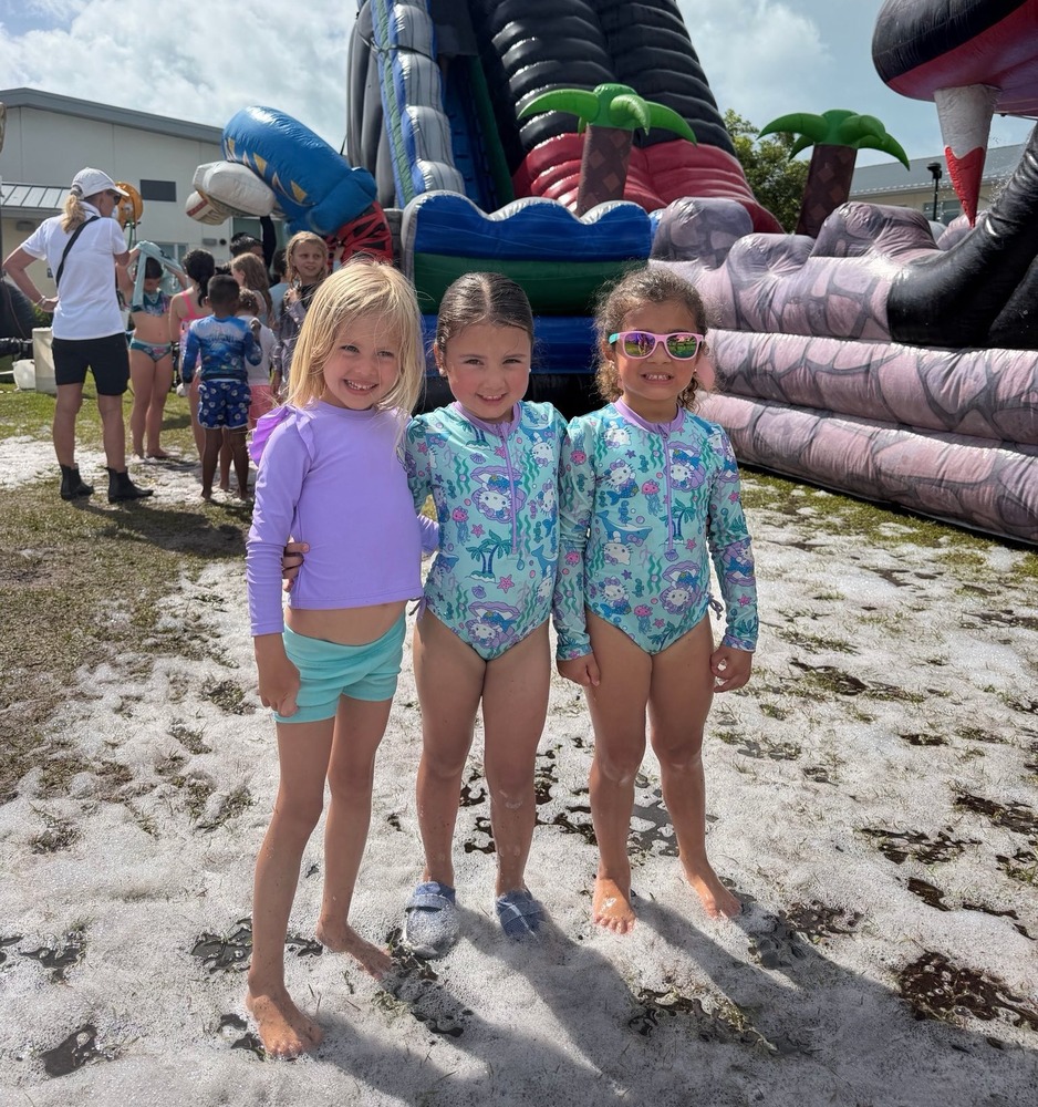 Three girls together at the end of year carnival