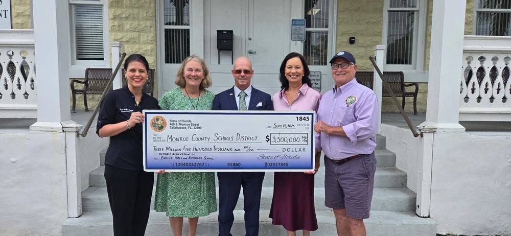 Group displays big check