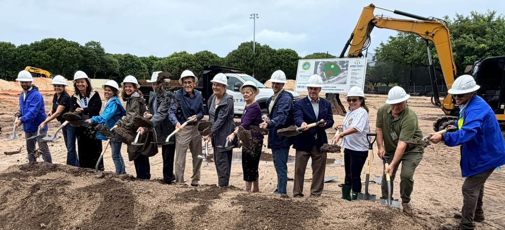 Groundbreaking group with shovels