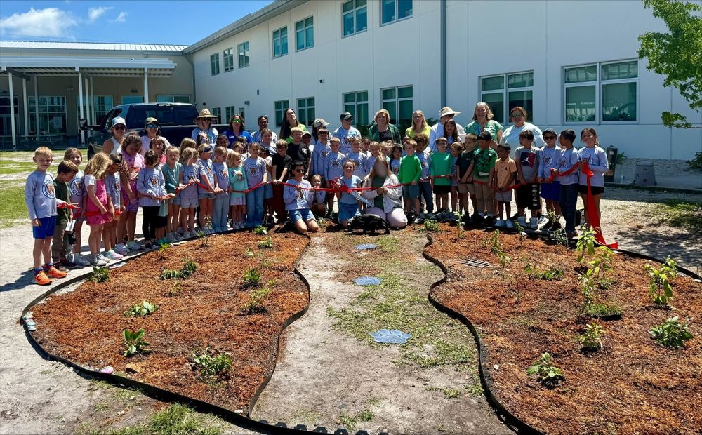 PKS Ribbon Cutting with students and leadership