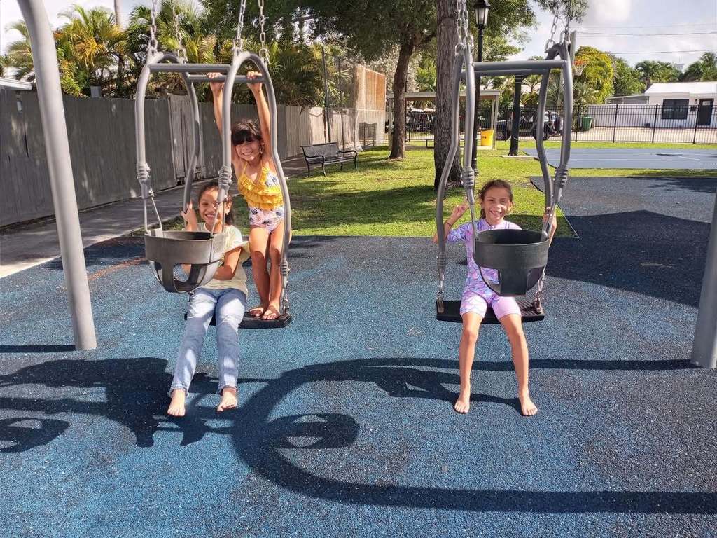 kids playing on swingset