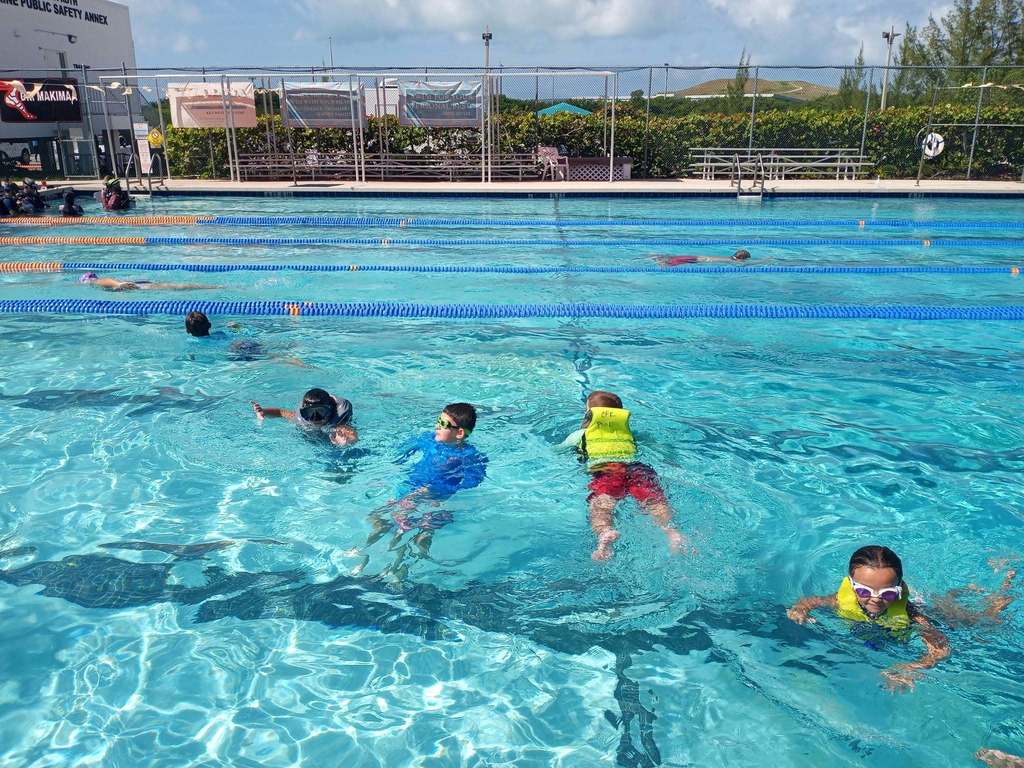kids swimming in pool