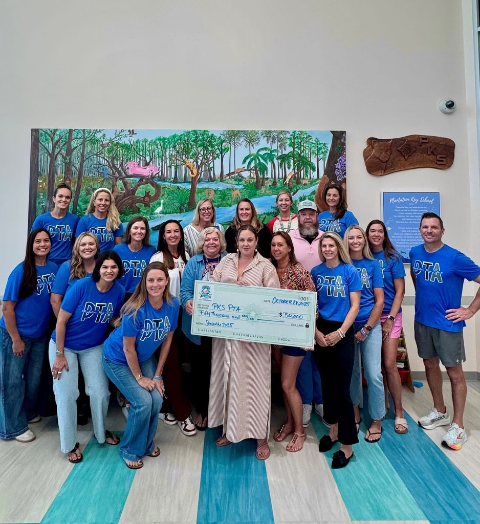 photo of 50,000 check being presented to PKS from Conch Scramble Charity Tournament