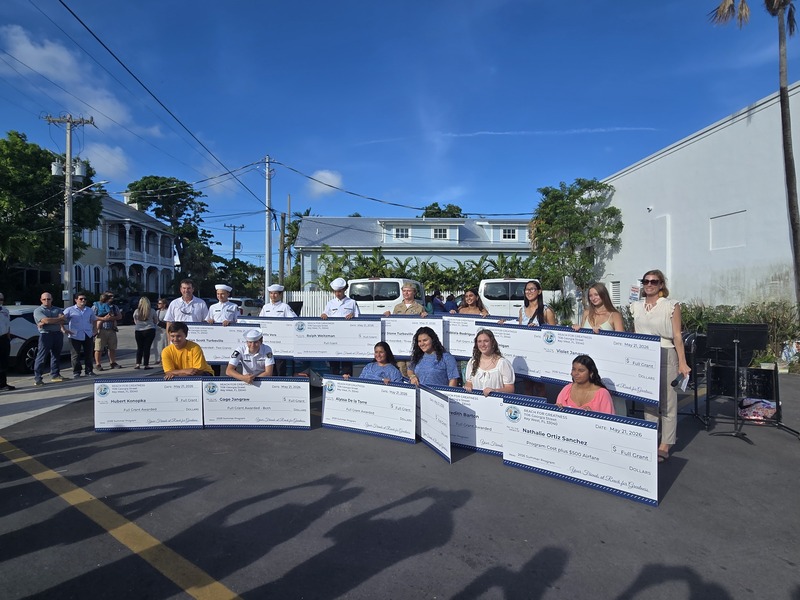 students with big checks