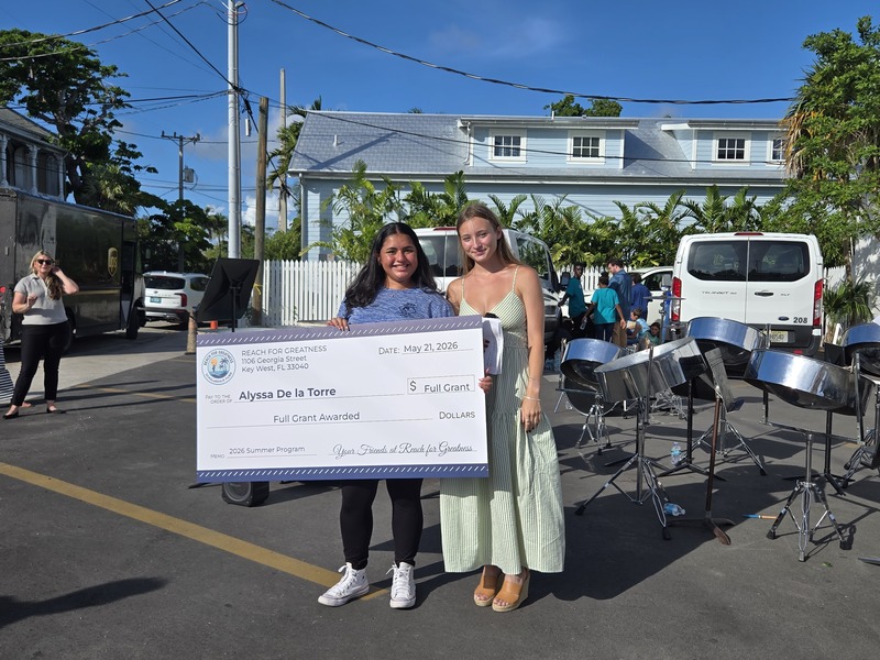 students with big check