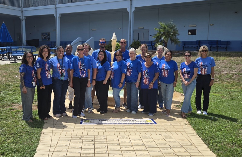 staff in patriotic shirts