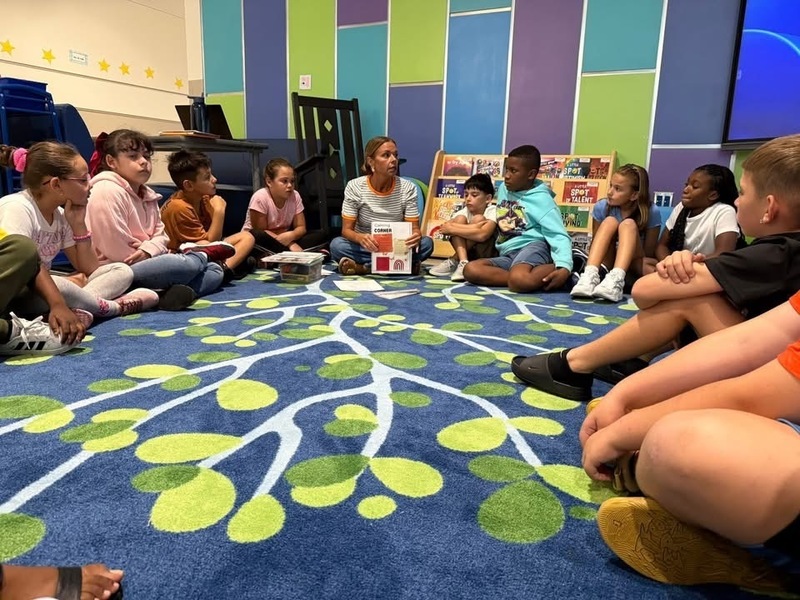 Orcutt meeting with students