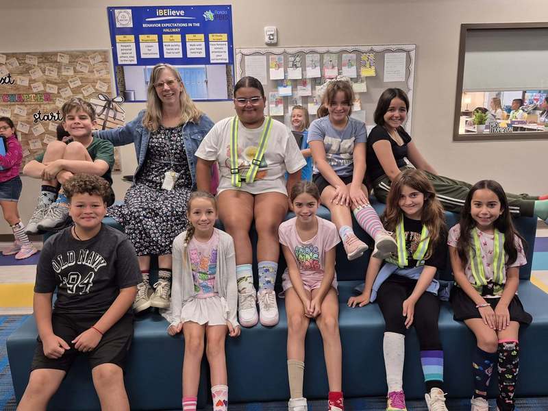 group of kids with teacher