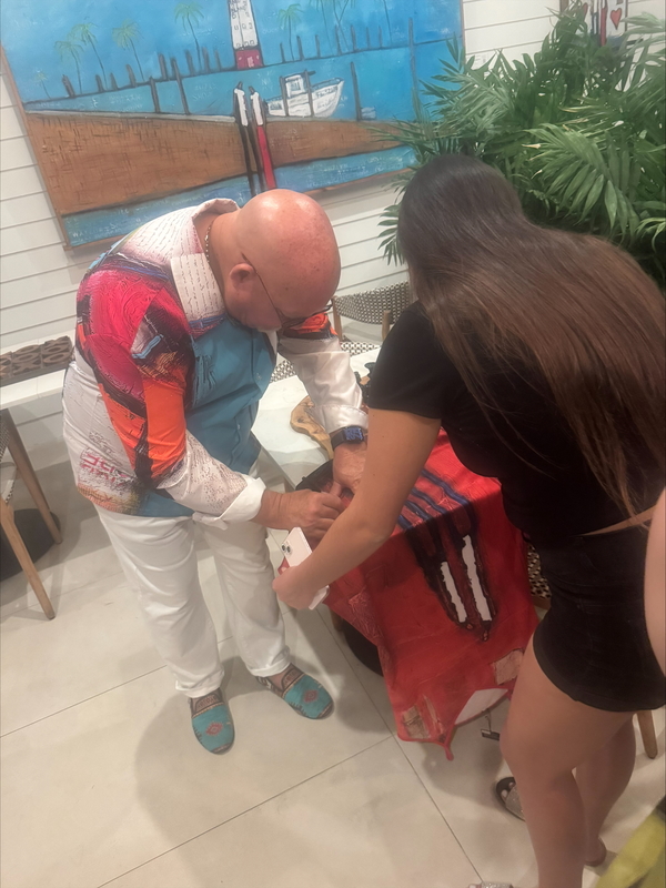 marathon fashion students  posing with designs