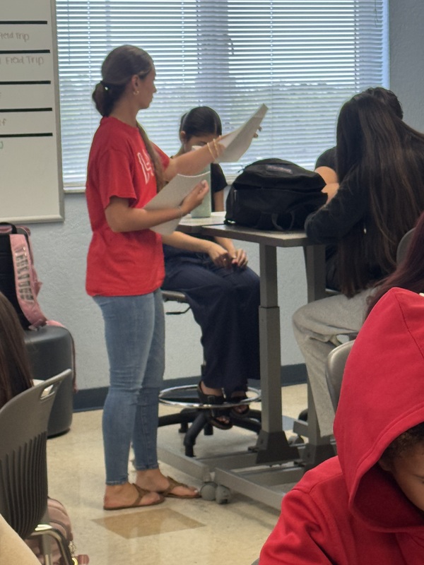 students teaching other students a lesson