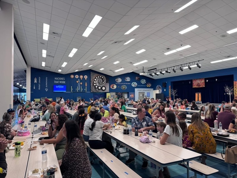 families enjoying lunch with their students
