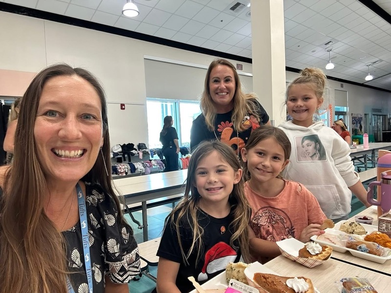 third graders enjoying lunch with Ms, Snyder and Mrs. Houston