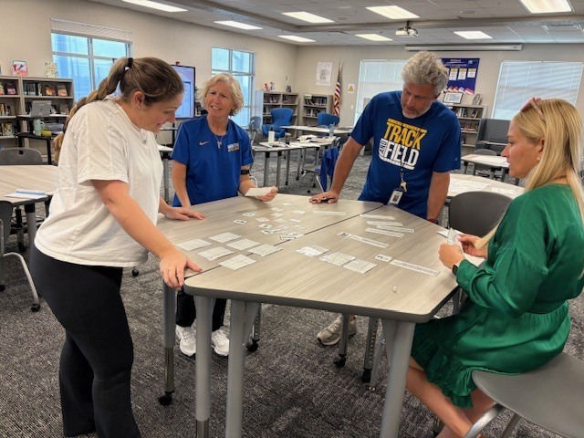 teachers around table