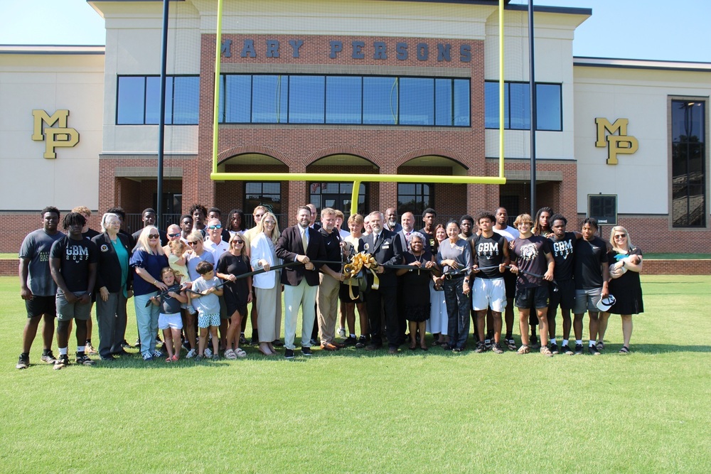 group shot taken at ribbon cutting