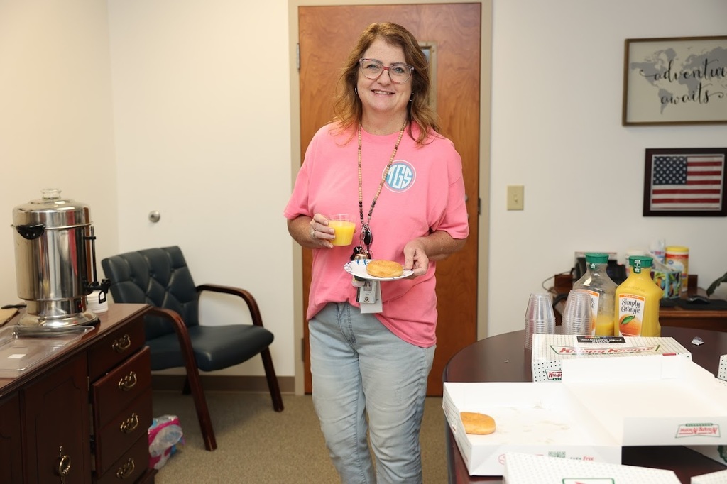 MRs. Hayman with her donut and juice