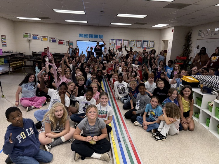 students pictured with Jamie Maurice