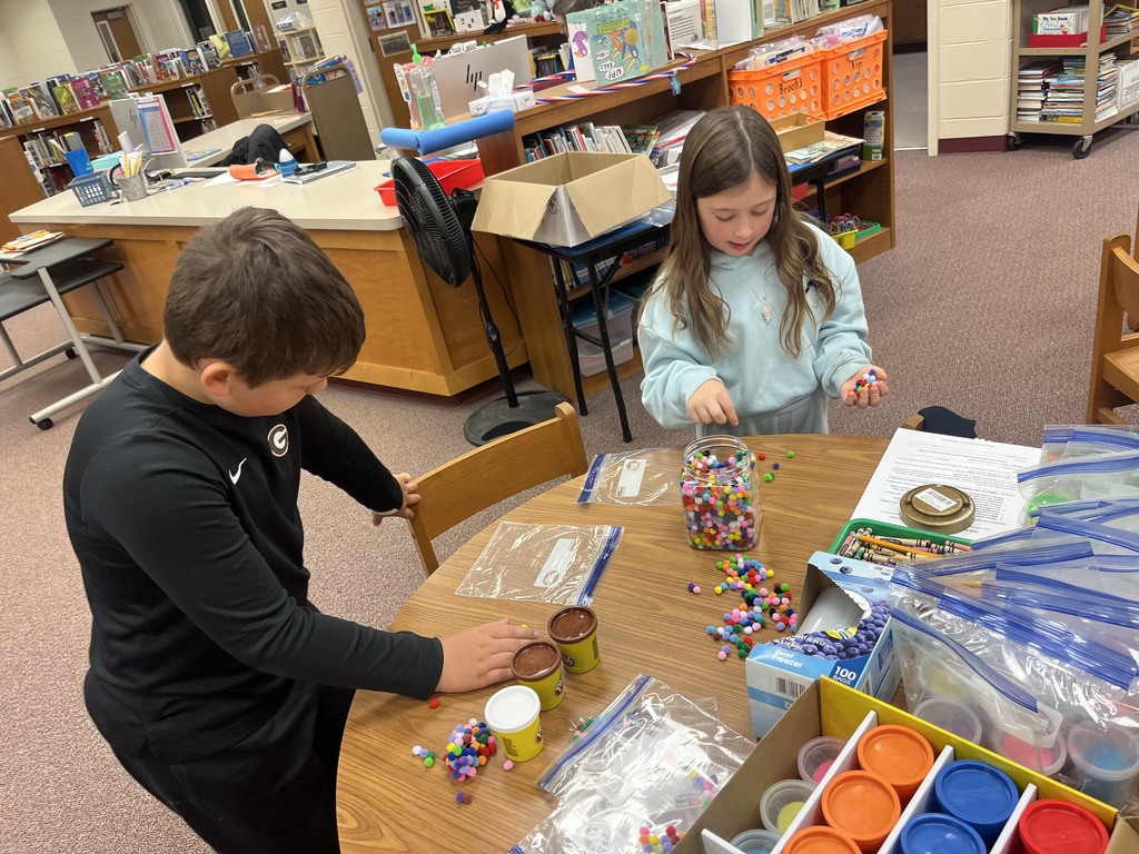 HES Club Tome students working on Writing Readiness Bags for PreK