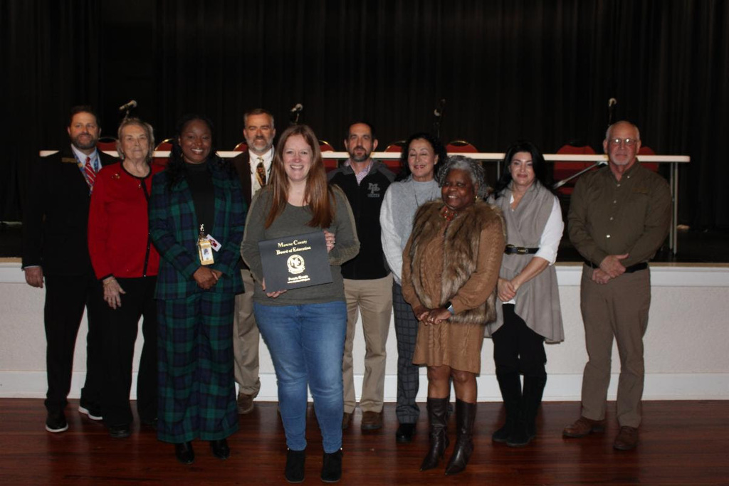 Ag teacher, Mrs. Kera Davis  and Board of Education members. 