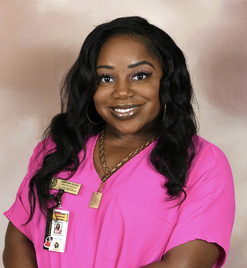 Daphene Blash in pink shirt