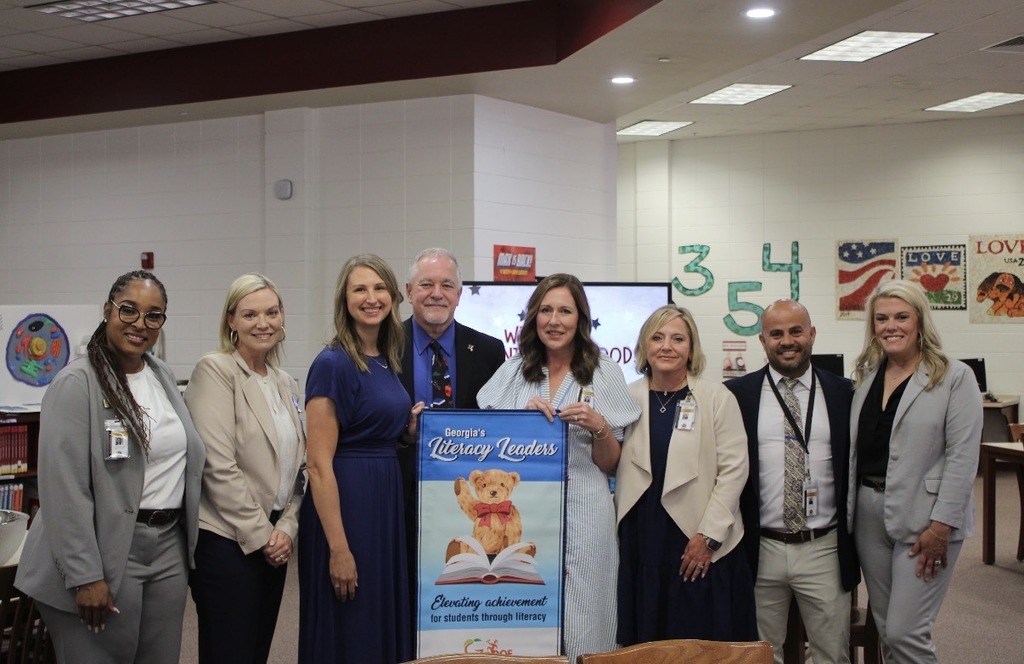 Staff receiving the state Literacy Leader award.