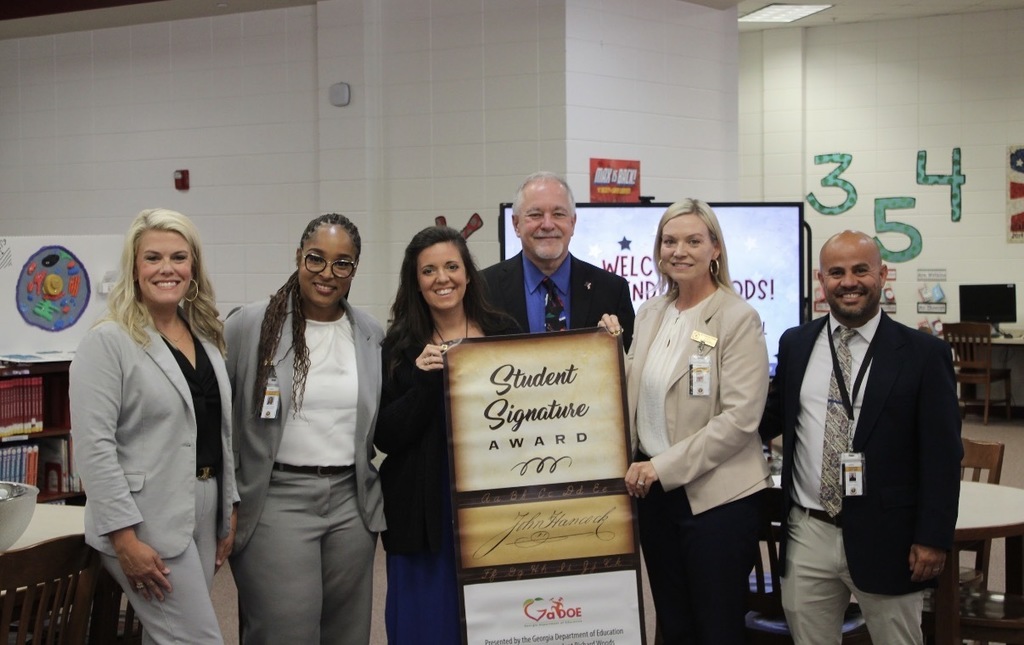 Staff receiving the state Signature award.