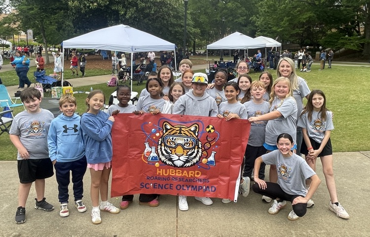 science Olympiad team holding banner at state competition